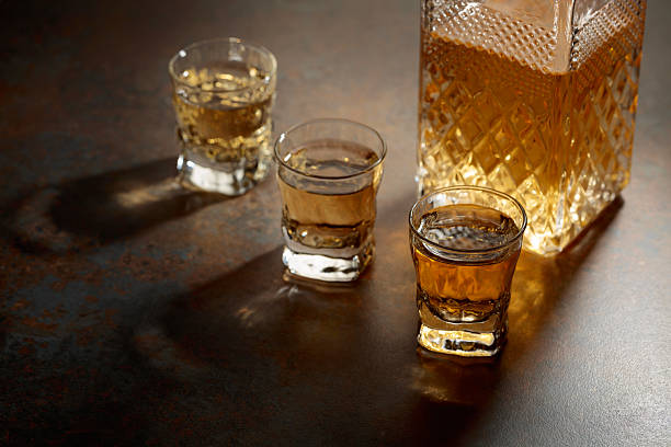istock Decanter and small glasses of whiskey. 2234642825