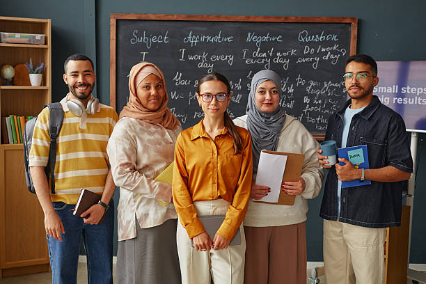 istock Diverse Young Adult Students Standing Together in Language School Classroom 2234645324