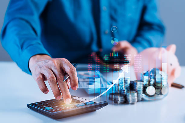 istock Analyzing Financial Growth: A Man with a Graph Illustrating Investment Progress 2234649169