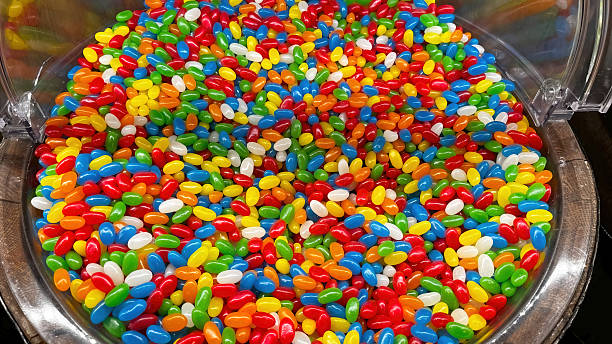Bright and colorful jelly beans piled up in a large bowl.