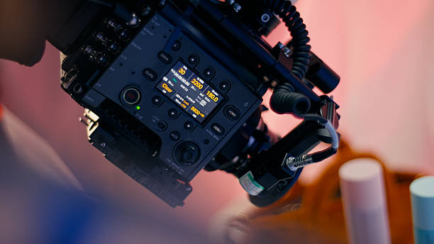 istock Photography studio with modern equipment. Camera moving on a crane and filming. Modern commercial film and photography studio 2234656357