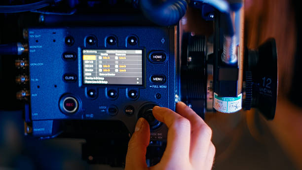 1st AC is pulling focus.More filmmaking images:
