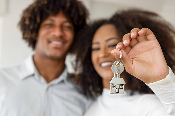 istock Young couple moving into a new house 2234657756