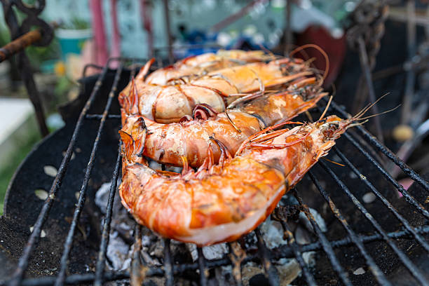 istock River prawn big shrimp grilled on fire smoke 2234658317