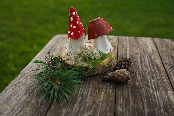 istock Fall craft from eco-conscious materials, combining natural and recycled elements into a mushroom. 2234659320