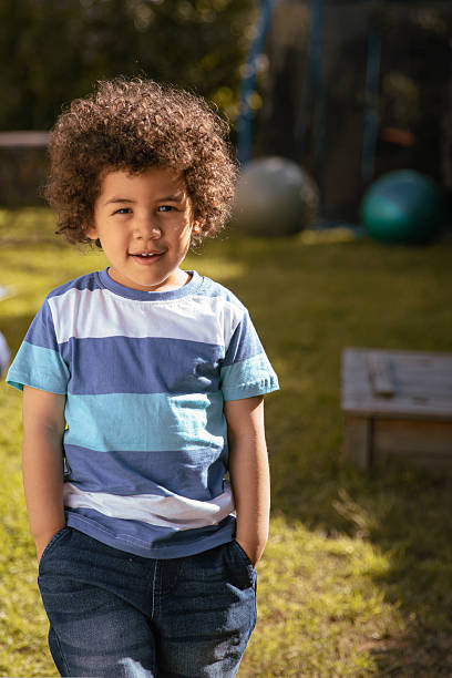 istock Close-Up of Boy in Garden 2234659749