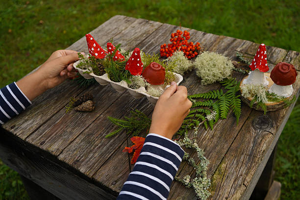 istock Fall-themed project made from natural and repurposed materials, featuring a mushroom design. 2234659773