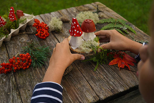 Fall-themed project made from natural and repurposed materials, featuring a mushroom design.