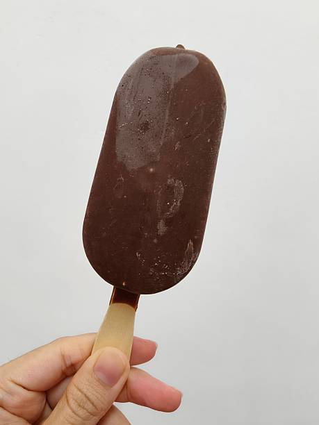 istock Chocolate Covered Almond Ice Cream Bar on Stick 2234660107