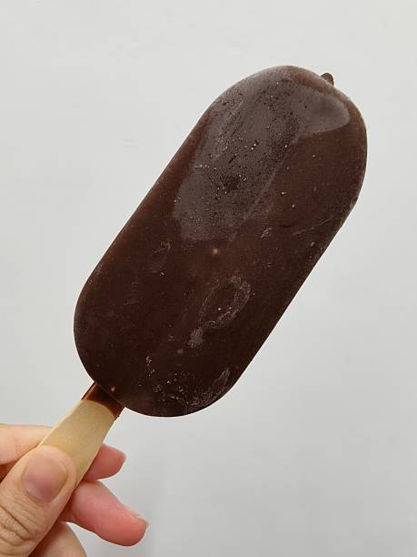istock Chocolate Covered Almond Ice Cream Bar on Stick 2234660126