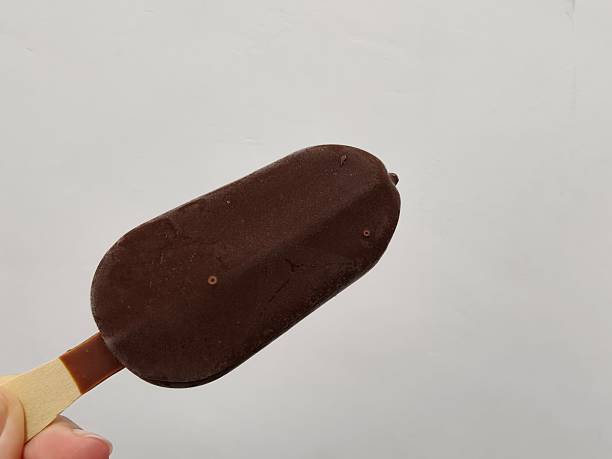 istock Chocolate Covered Almond Ice Cream Bar on Stick 2234660140
