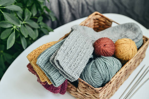 istock Hand-knitted woolen socks of different colors 2234661647