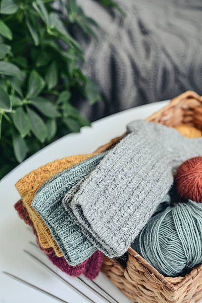 istock Hand-knitted woolen socks of different colors 2234661652
