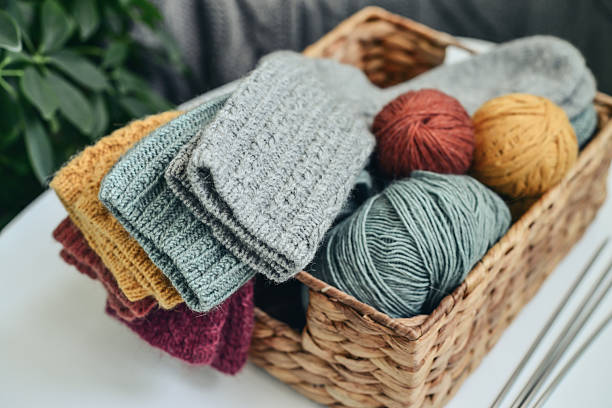 istock Hand-knitted woolen socks of different colors 2234661654