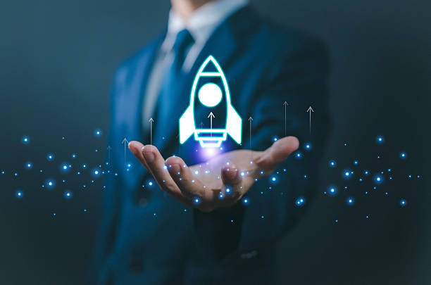 istock Businessman holding digital rocket icon, symbolizing startup launch, innovation, business growth, entrepreneurship, technology development, leadership, success, and future vision. 2234661831