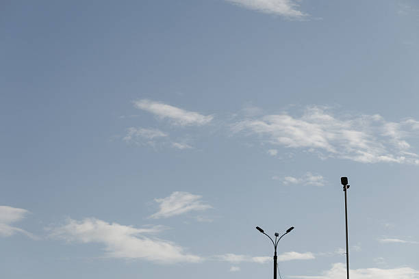 istock Modern Solar LED Streetlight Against Cloudy Sky 2234664004