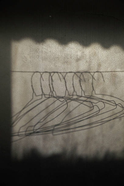 istock Shadow of hanger exposed to sunlight 2234666999