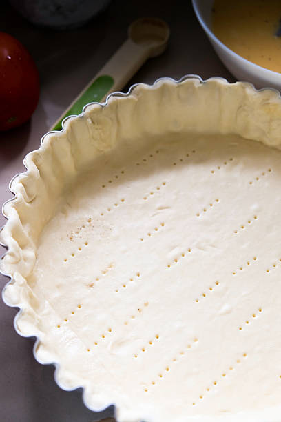 istock Pastry arranged on an aluminum baking sheet to make quiche 2234667027