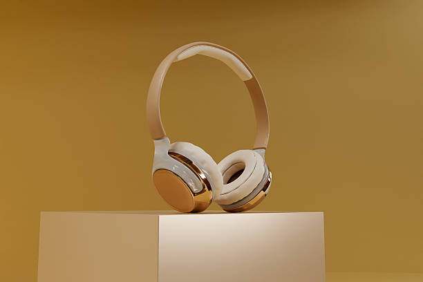istock 3D surround photo wireless headphones on beige background. 3d render 2234670998