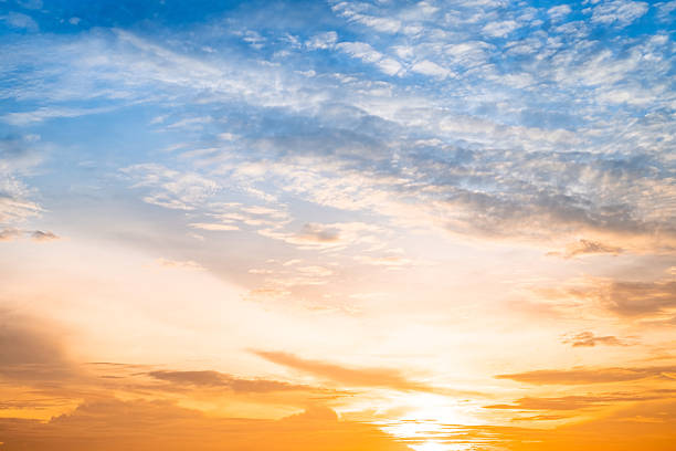 istock Beautiful , luxury soft gradient orange gold clouds and sunlight on the blue sky perfect for the background, take in evening,Twilight, Large size, high definition landscape photo 2234672673