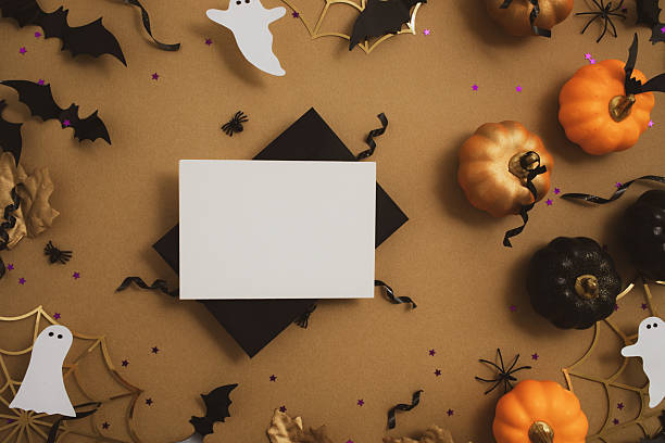 istock Halloween party background from empty black blank with festive decoration from pumpkins, bats, spider web, confetti top view. 2234673055