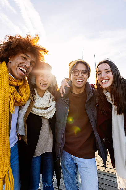 istock Happy multi-ethnic friends enjoying winter holidays together 2234675629