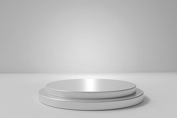 istock 3d white podium on table against white background. 3d rendering of realistic presentation for product advertising. 2234675976