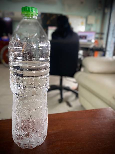 istock A bottle of cold water is on the table. 2234677190