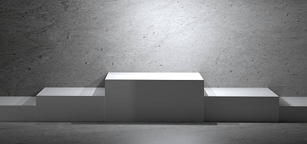 3D white podium stage with spotlight on gray concrete wall, modern minimal cube design for product display, exhibition mockup, fashion branding, and luxury showcase.
