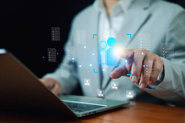 istock Businessman using digital HR recruitment system with employee profile selection, data management, and candidate evaluation dashboard for human resources, hiring process, and workforce optimization. 2234685348
