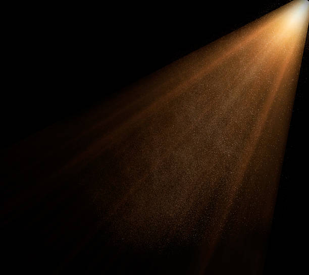 istock Golden light beam illuminating dust particles creates a magical atmosphere 2234688106