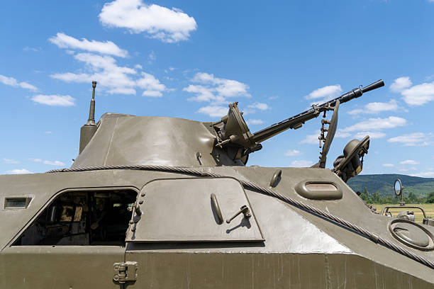 End of a conflict symbolized by a war tank and a white flower