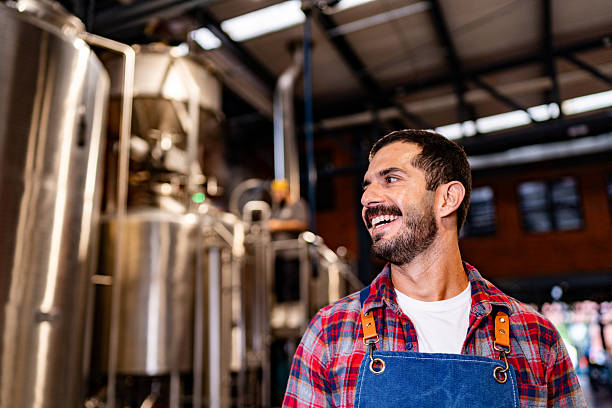 istock Mid adult man contemplating at brewery 2234690876