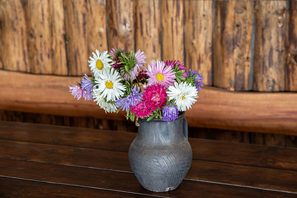 istock colorful flowers in a vintage basket 2234695127