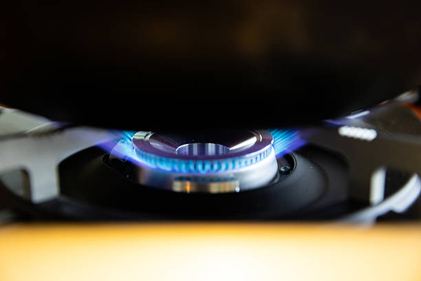 gas stove fire burns in the kitchen