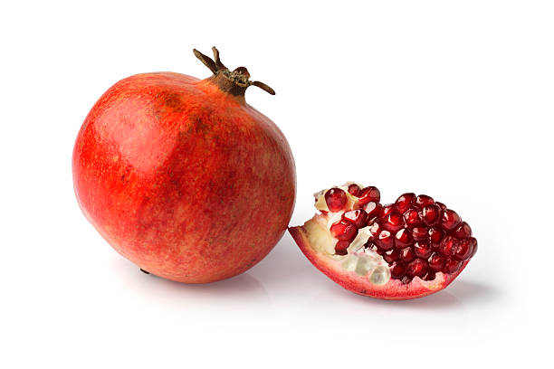 Sweet pomegranates isolated on white background