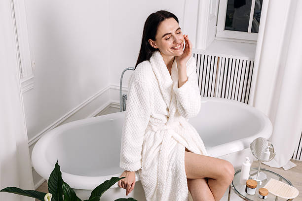 istock Enjoying a morning skincare routine in a modern bathroom setting 2234698617