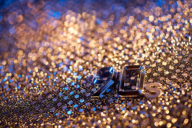 istock Shiny Metallic 90s Typography on Glittering Retro Gold and Blue Background 2234698698