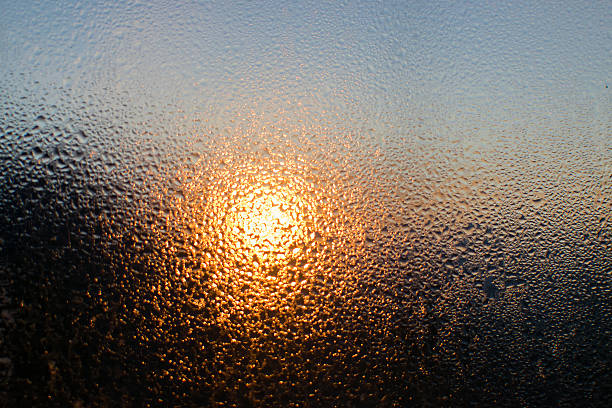 istock Sunrise shot behind glass filled with dew drops, abstract image, Kanchenjunga mountain range in the morning, Ravangla, Sikkim. Scenic view of great Himalaya, India, 2234702051