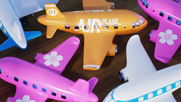 Group of stylized toy airplanes with different themes and different colors, 3D computer graphics, shot on black background