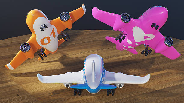 Group of stylized toy airplanes with different themes and different colors, 3D computer graphics, shot on wooden table surface