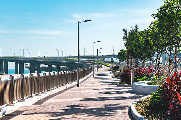 istock View of a Tseung Kwan O waterfront promenade under blue sky 2234707364