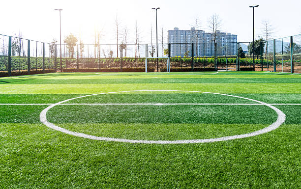 istock Empty soccer green field with circle white stripe 2234709517