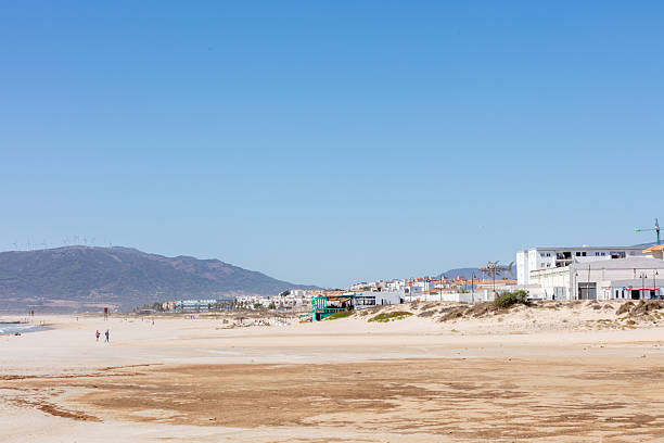 istock View of Tarifa beach with modern apartment buildings and coastal structures under a clear blue sky. Tarifa. Spain. September 2025. 2234710424