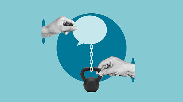 istock Censorship and restricted social dialogue are shown by speech bubble chained to the kettlebell. Freedom of speech and press 2234715236