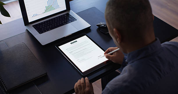 istock Businessman Signing Electronic Contract On Digital Tablet 2234724262