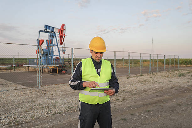 istock Man Worker At Petroleum Infrastructure, Safety First 2234724668