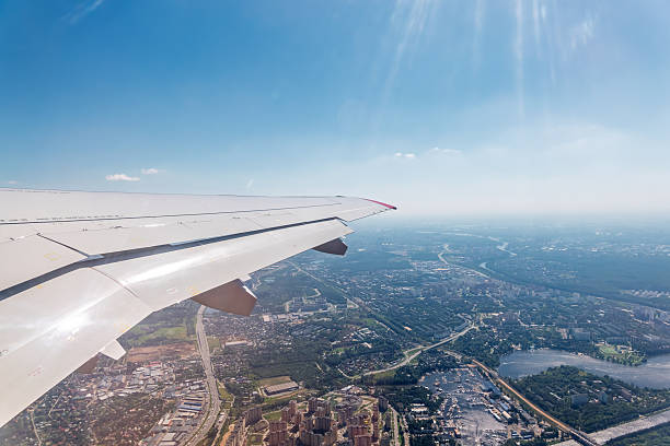 istock View from the airplane window during taking off on a clear summer morning 2234726035