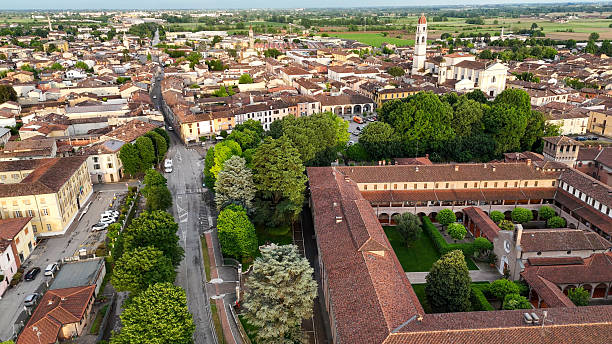 istock Aerial panorama revealing medieval Rocca Viscontea fortress perched above Oglio river, nestled within Pontevico town landscape, Brescia province, northern Italy 2234731836