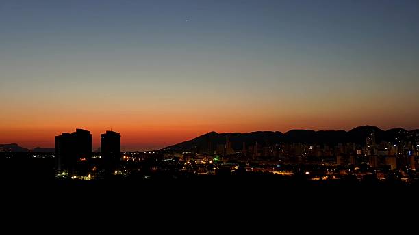 istock Breathtaking Sunset Over an Urban Landscape with Dazzling Colors and Beautiful Atmosphere 2234732820